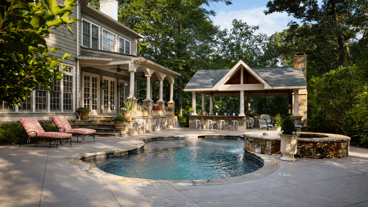 custom pool with outdoor patio