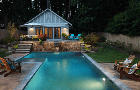 Custom pool design and backyard renovation in Atlanta includes a stunning, custom rectilinear swimming pool with irregular Tennessee gray flagstone coping