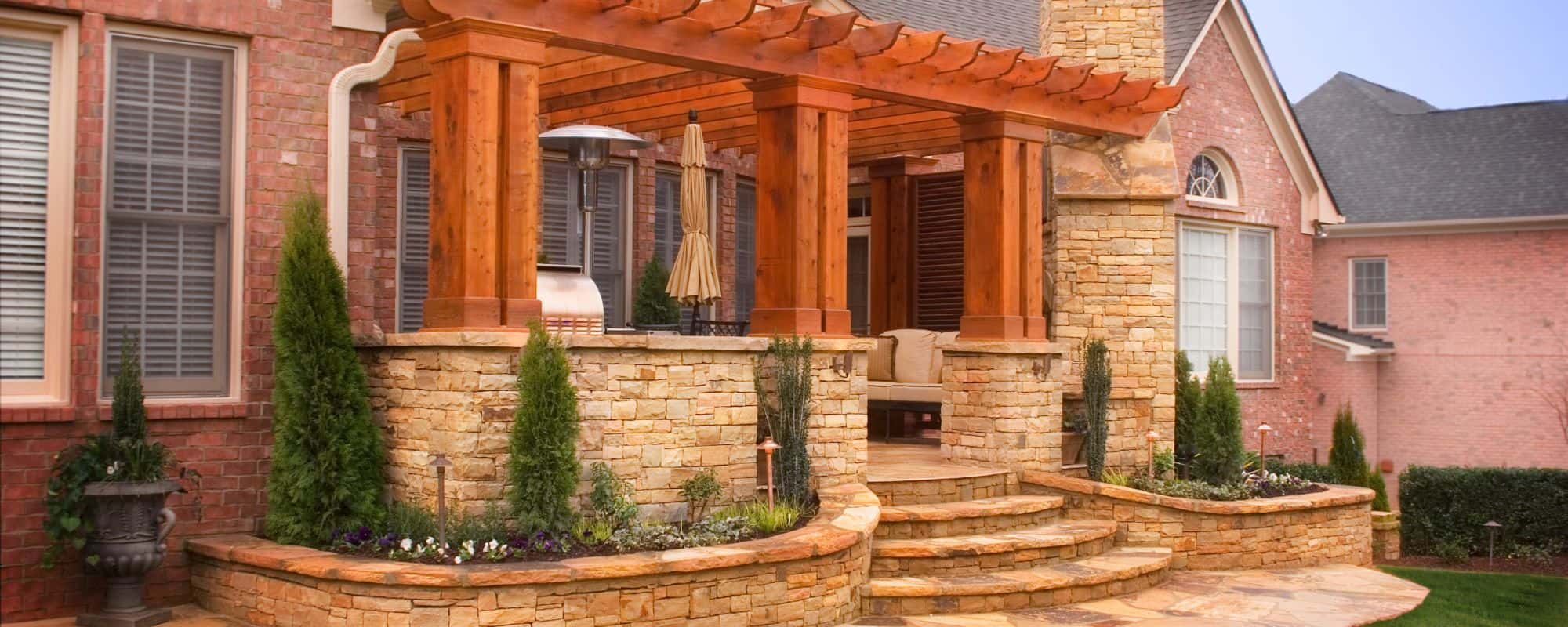 Front of home patio. Stone stairs and custom landscaping