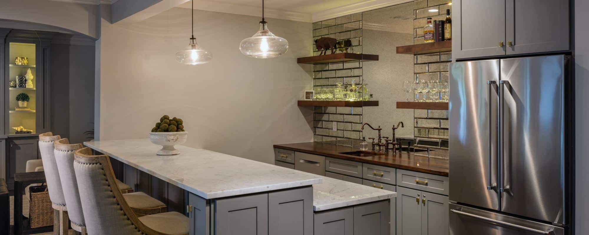 kitchen with white marble counter top and wooden cabinets