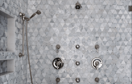Frameless Glass Shower with Niche, Shower System with Multiple Shower Heads & Body Sprays, Polished Nickel Fixtures and Mosaic Marble Wall Tile