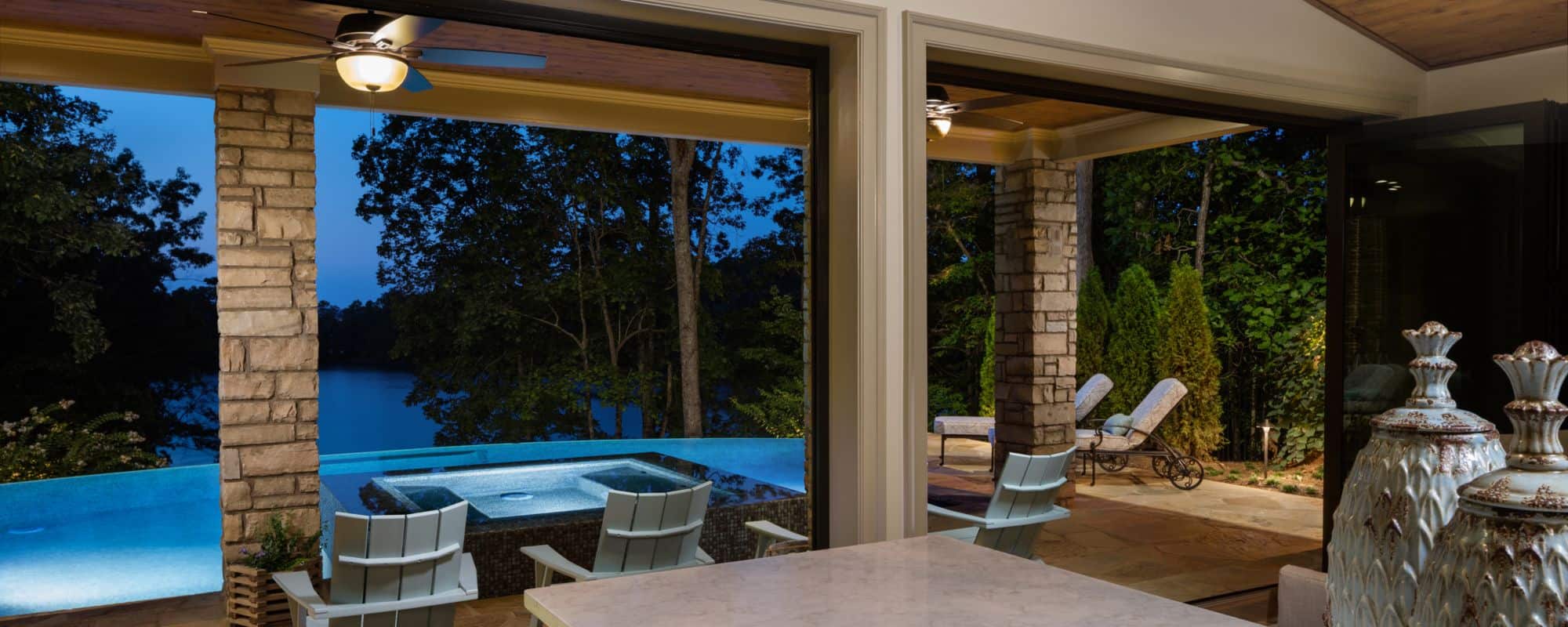 renovated patio and pool with lakefront view