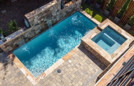 air view of pool with waterfall spouts