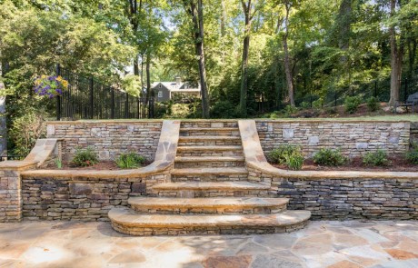 stone stairs that lead to patio