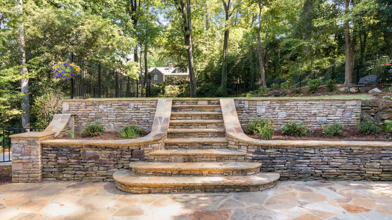 stone stairs that lead to patio