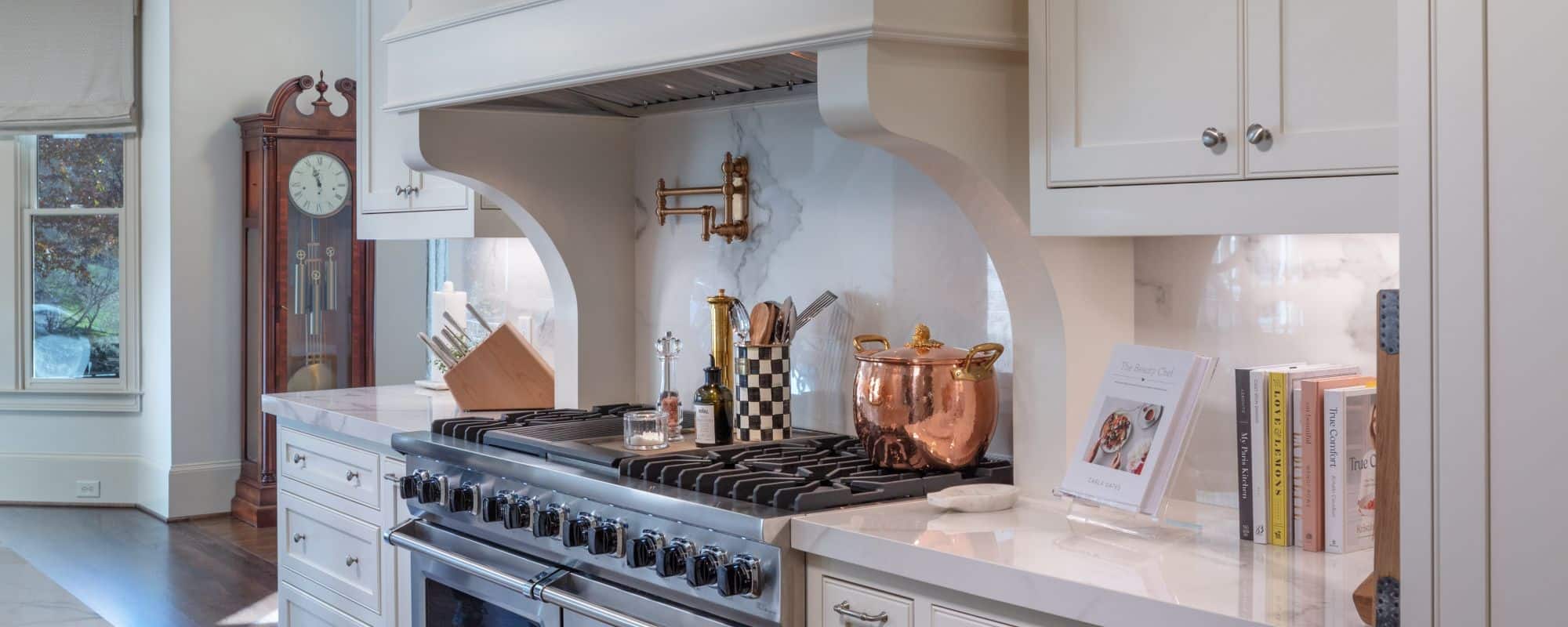 kitchen with white marble countertop and large stove
