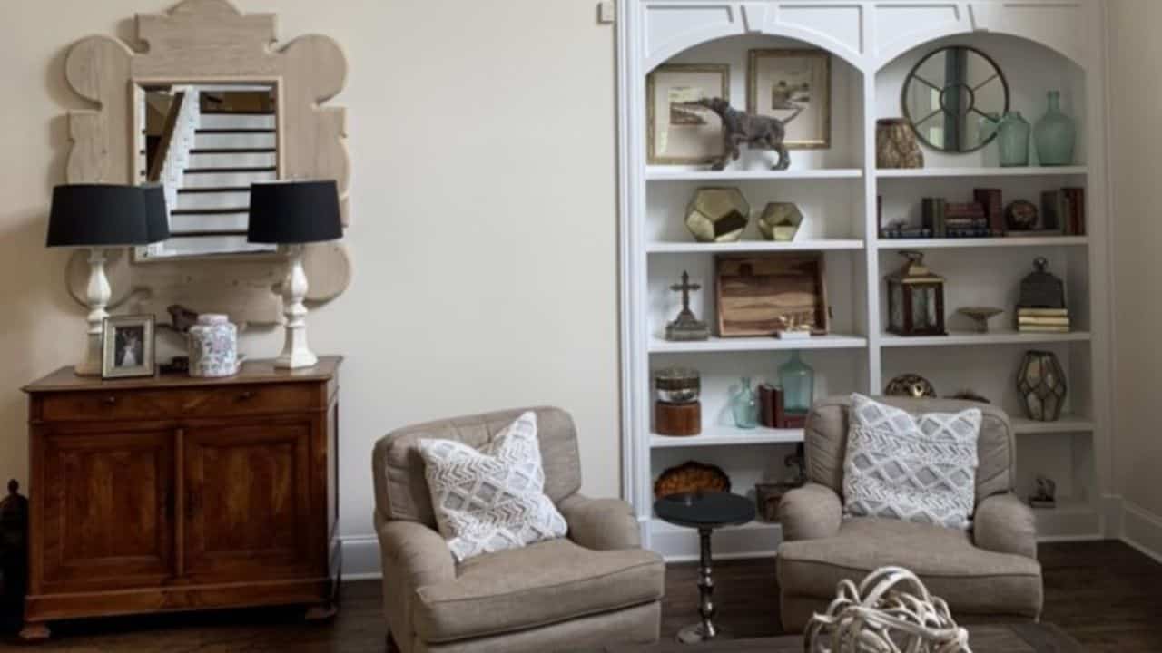 antique living room with beige sofas