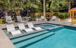 custom pool with in-water in-pool furniture